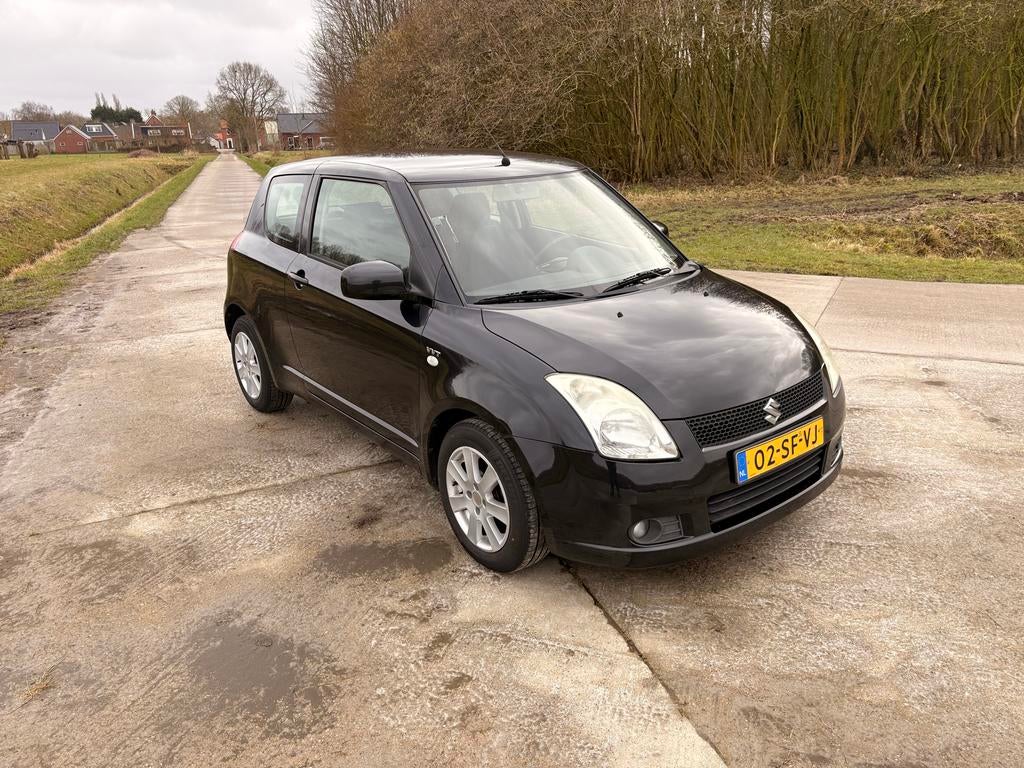 Suzuki Swift 1.5 3D 2006 Zwart, Auto's, Suzuki, Voorwielaandrijving, 40 €/maand, Handgeschakeld, Grijs