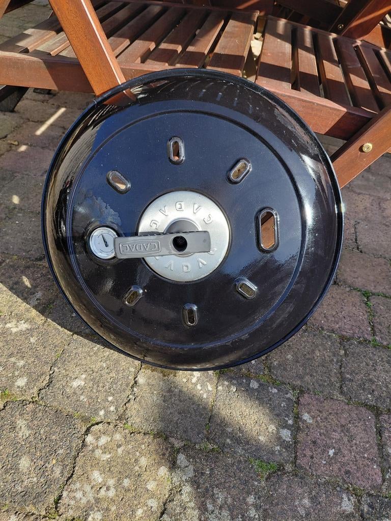 Deksel skottelbraai (Cadac), Ophalen