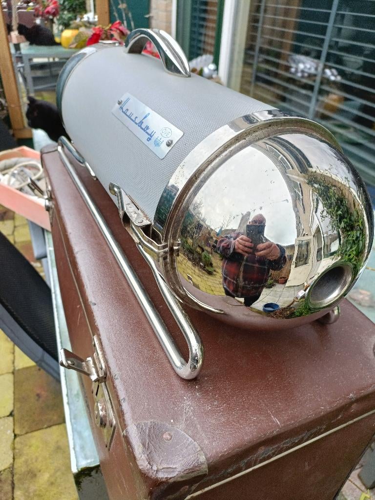 antieke stofzuiger, Ophalen