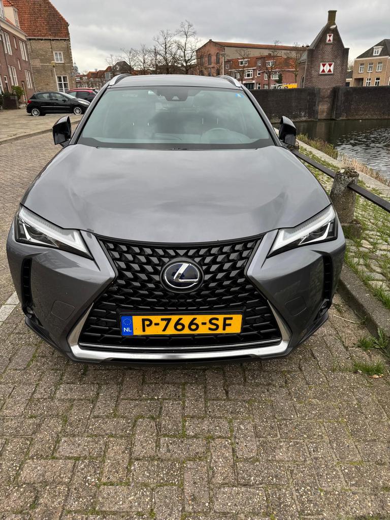 Lexus UX 250h Hybrid 184pk CVT 2021 Grijs, Auto's, Lexus, USB, 750 kg, Alcantara, 1987 cc