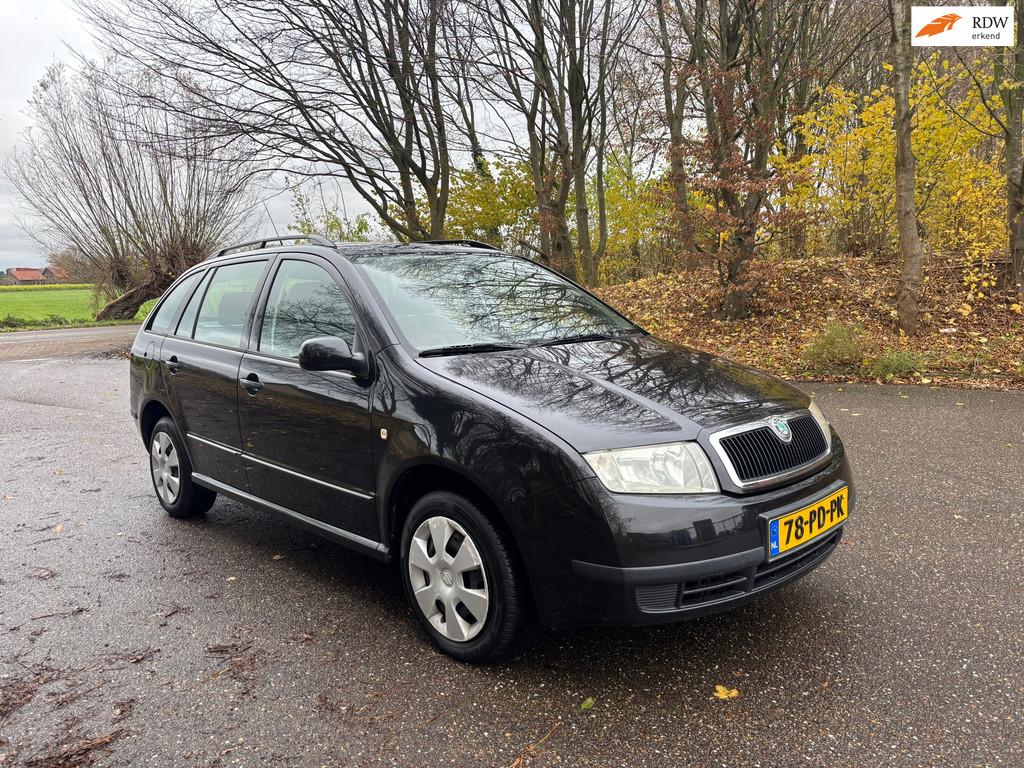 Skoda Fabia Combi 1.4-16V Choice | Airco | APK 12-2026!, Voorwielaandrijving, Gebruikt, 4 cilinders, Parkeersensor