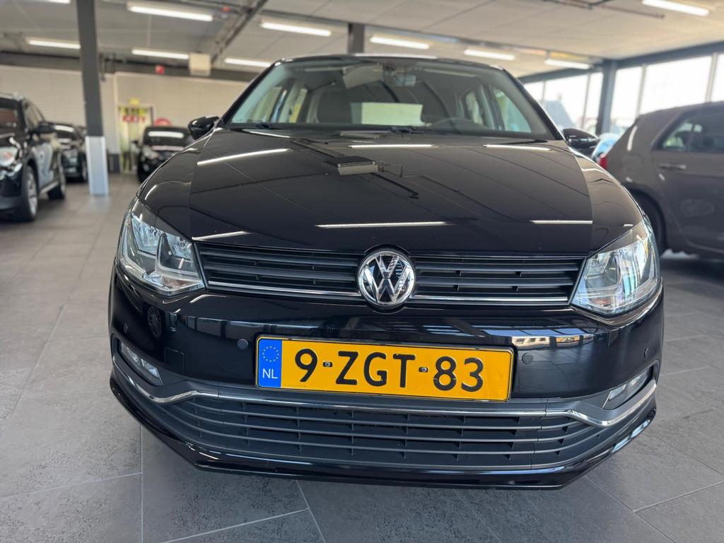 Volkswagen Polo 1.2 TSI Comfortline automaat Clima navigatie, Auto's, Stof, Euro 6, 4 cilinders, 1039 kg