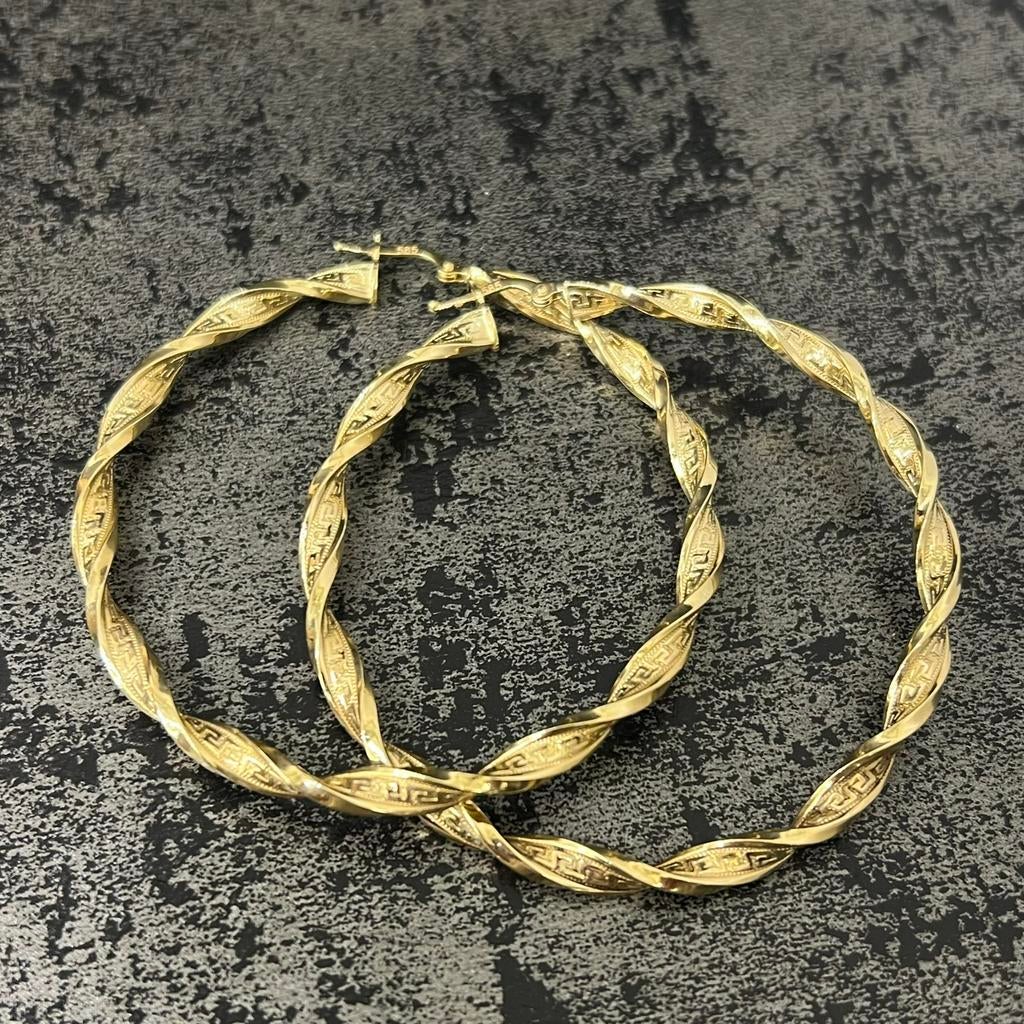 14 karaat gouden oorbellen wokkels model nieuw, Ophalen of Verzenden, Zo goed als nieuw, Goud