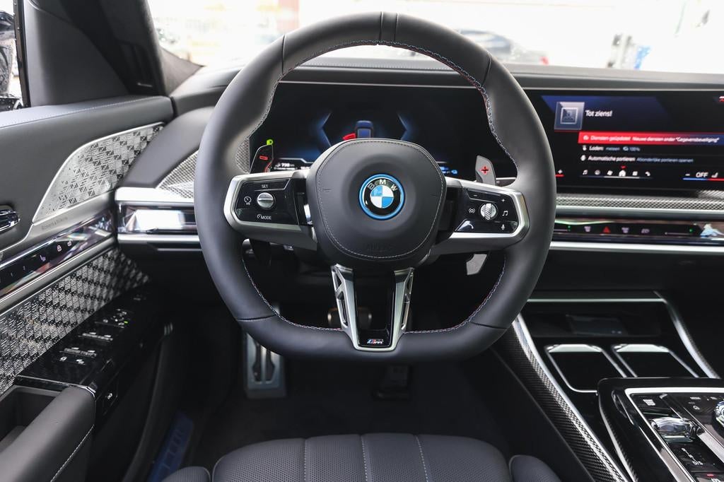BMW 7 Serie M760e xDrive High Executive Automaat / Panoramad, Auto's, BMW, Automaat, Zwart, Zwart, Leder