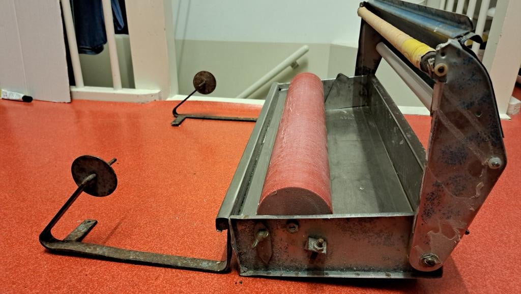 Behangmachine/ bak, Ophalen