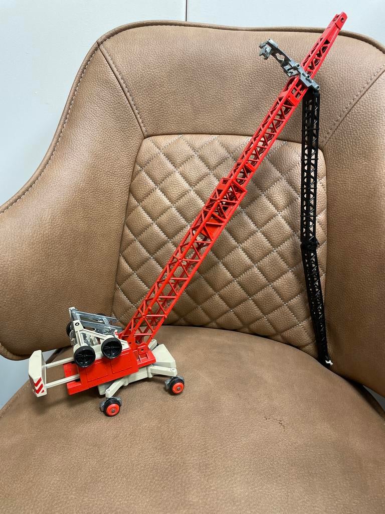 Rode speelgoedkraan/opknapper, Gebruikt, @, /, ?