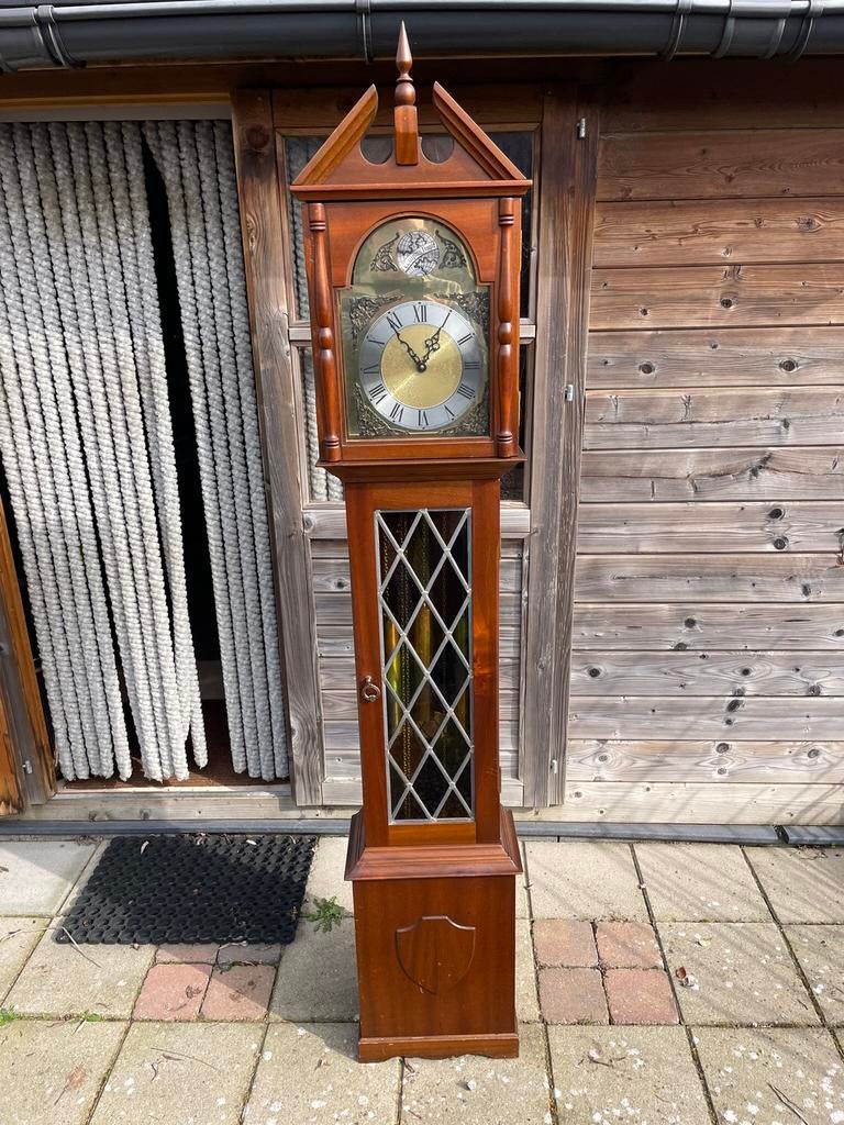 Staande klok, Ophalen