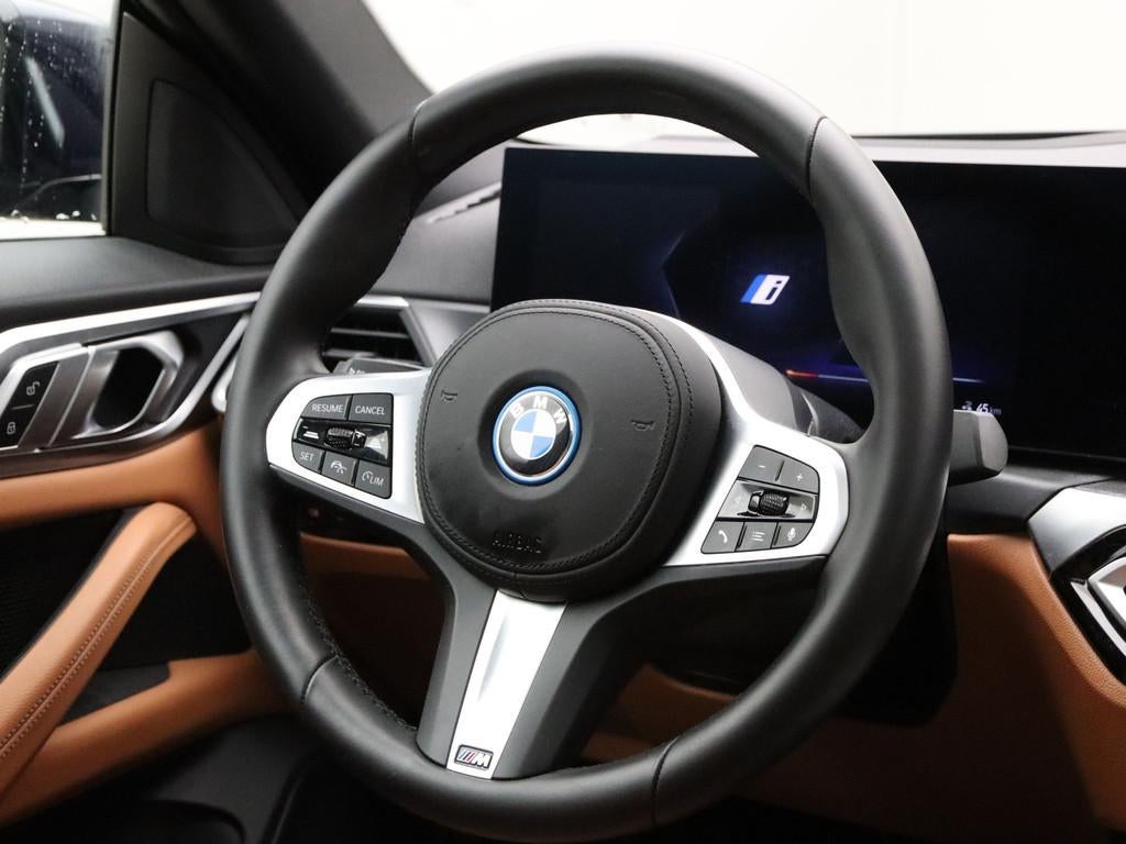 BMW i4 eDrive40 High Executive 84 kWh (bj 2024, automaat), Auto's, Achterwielaandrijving, Gebruikt, Zwart, Met garantie (alle)