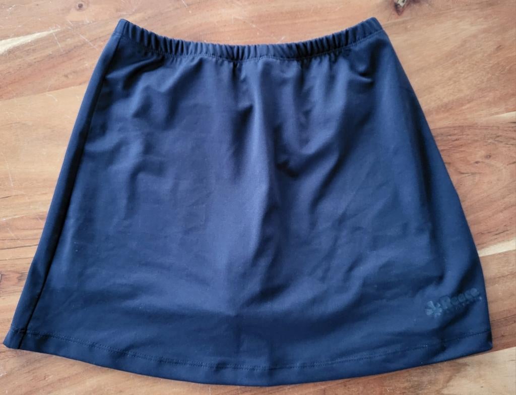 NIEUW Donkerblauw Reece hockeyrokje, maat XS, Ophalen, Nieuw, Kleding