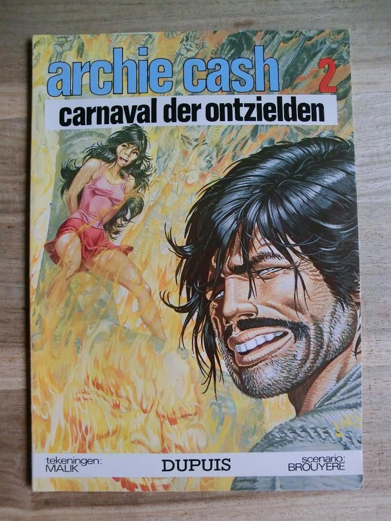 Carnaval der ontzielden - Gesigneerd Malik (William Tai), Eén stripboek, Ophalen of Verzenden, Gelezen