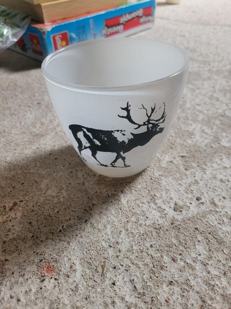 Waxinelichthouder met hert, Ophalen