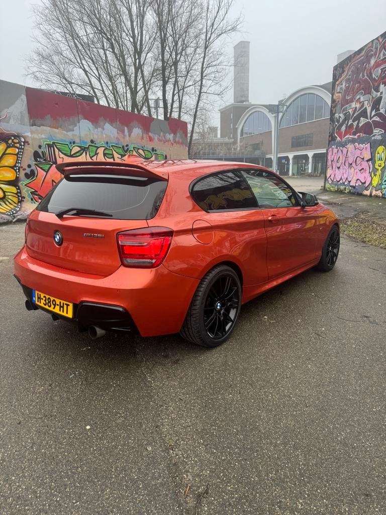 BMW 1 Serie M135i 2013, Auto's, Achterwielaandrijving, Zwart, Overige kleuren, 1415 kg