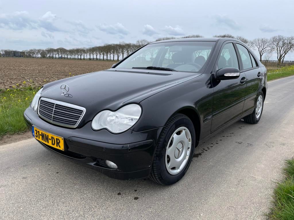 Mercedes C180 Kompressor van 12-2003 met origineel 173000 km, 13 km/l, Zwart, 1796 cc, Zwart