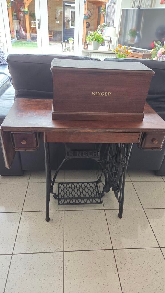 Mooie singer naaimachine, Ophalen