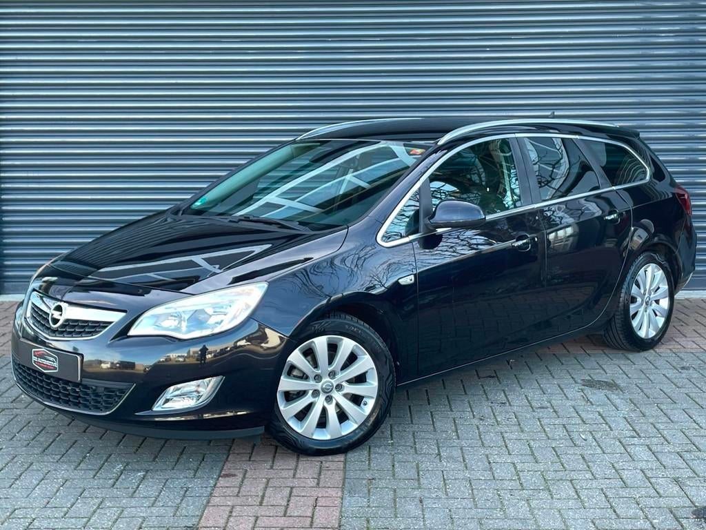 Opel Astra Sports Tourer 1.6 Turbo Cosmo Navi | Stoelverw |, Voorwielaandrijving, Euro 5, Gebruikt, Zwart