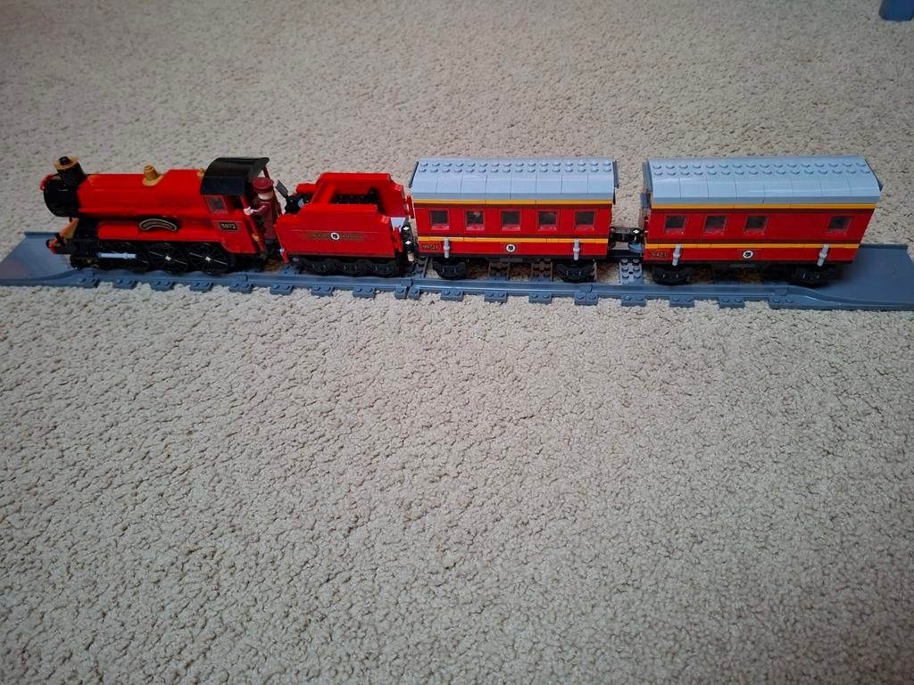 Rode trein met twee wagons, Ophalen