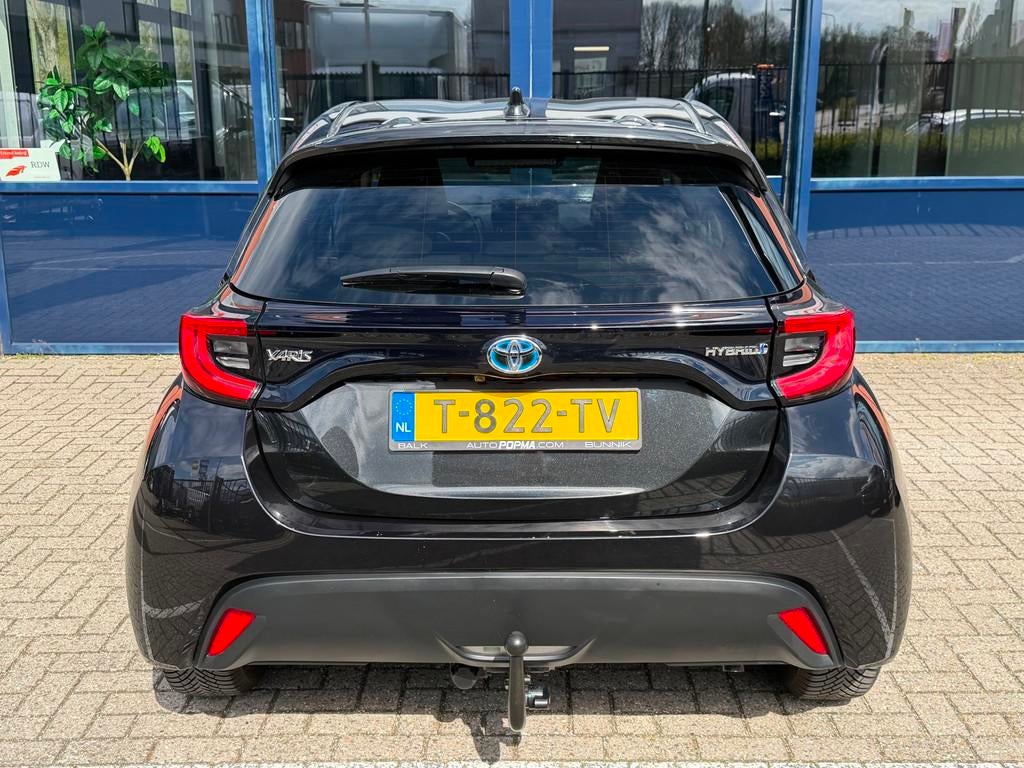 Toyota Yaris 1.5 Hybrid Dynamic Automaat / Trekhaak / Stoelv, Auto's, Gebruikt, 450 kg, 1490 cc, Bedrijf