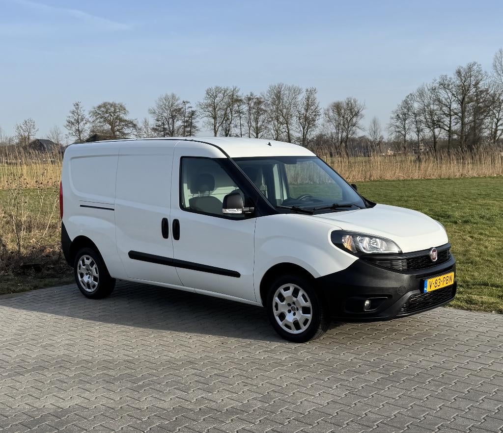 Fiat Doblo Cargo 1.4 T-jet 120pk L2h1 Maxi 2019 Airco Cruise, Auto's, Voorwielaandrijving, 4 cilinders, Wit, 14 km/l