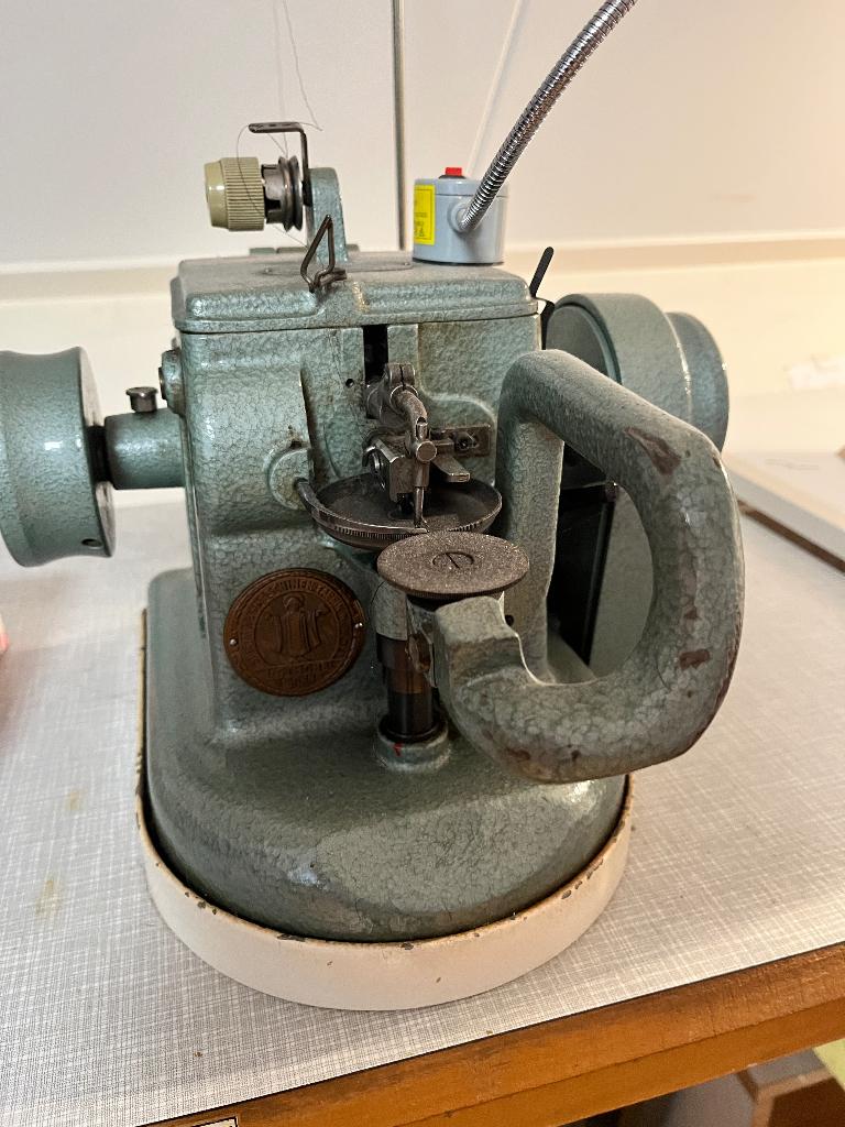 Bontstik naaimachine, Ophalen