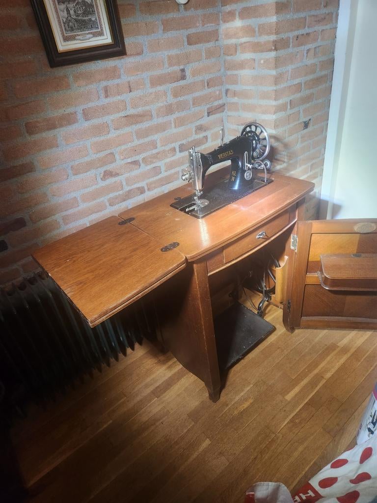 Antieke kast naaimachine, Ophalen