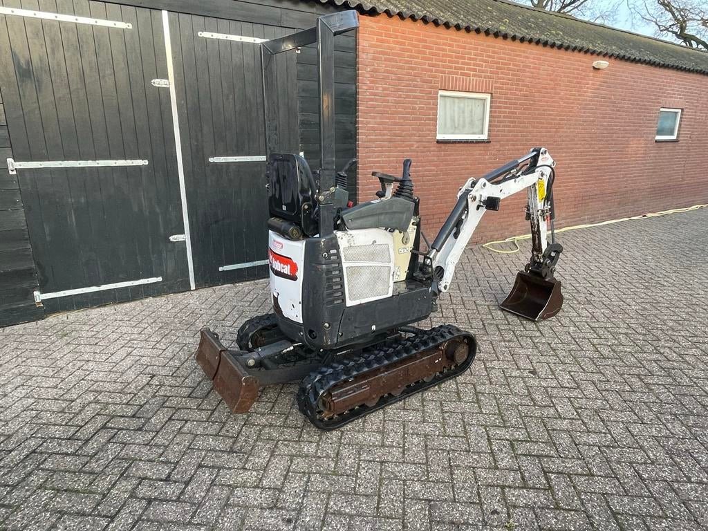Bobcat E10 Bj 2012 - Spelingsarm + extra sloop functie, Tuin en Terras, Ophalen of Verzenden