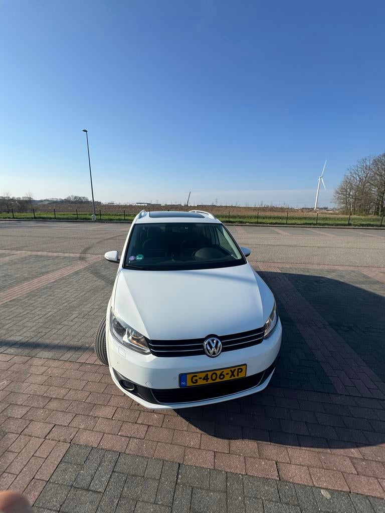 Volkswagen Touran Cup 1.2 TSI 77KW BMT 7P 2014 Wit, Voorwielaandrijving, Navigatiesysteem, 4 cilinders, 7 stoelen