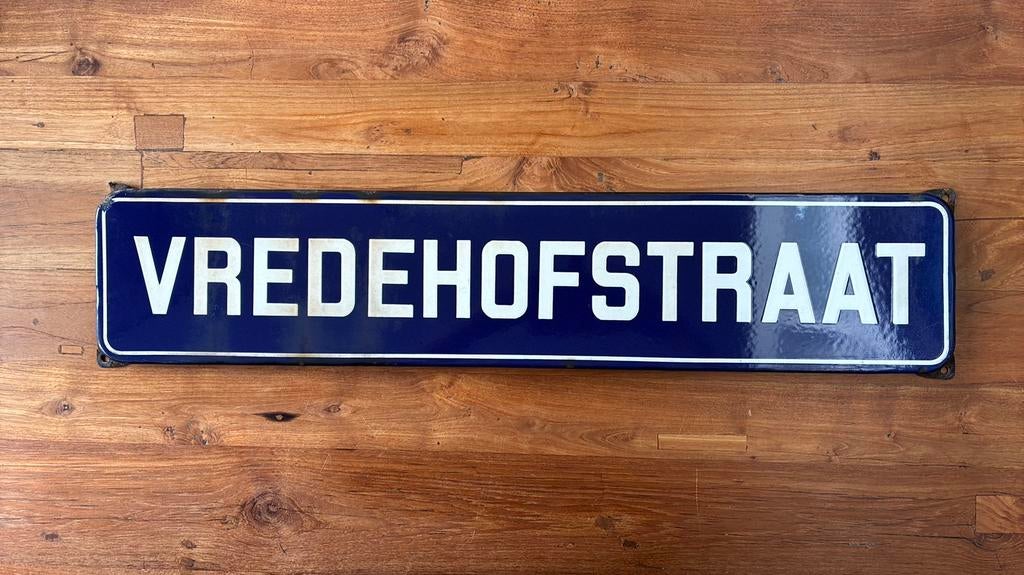 Vredehofstraat emaille straatnaambord, Ophalen