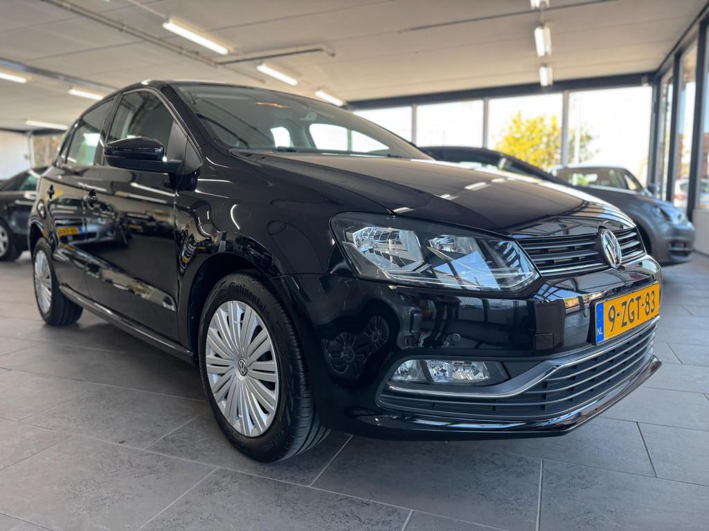 Volkswagen Polo 1.2 TSI Comfortline automaat Clima navigatie, Auto's, Stof, Euro 6, 4 cilinders, 1039 kg