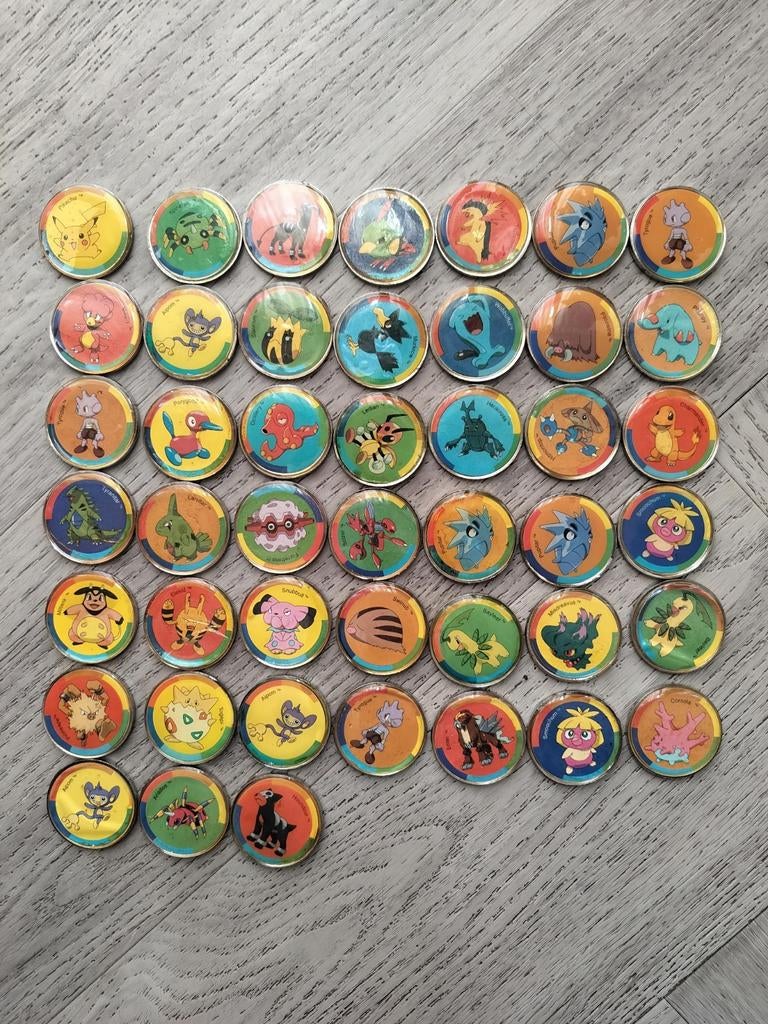 Vintage Pokémon munten / pogs uit 2001, Ophalen of Verzenden, Gebruikt, Overige typen