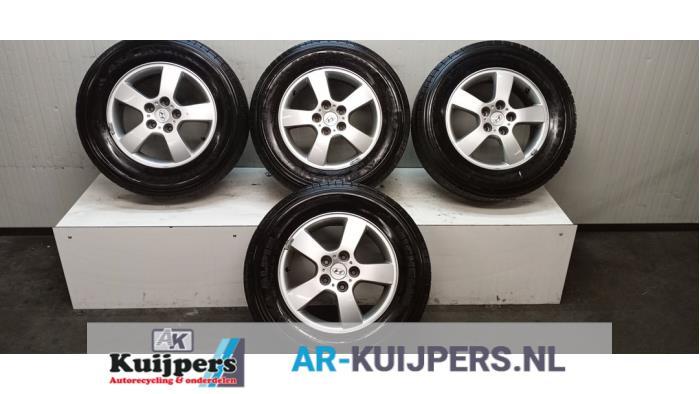 Sportvelgenset + winterbanden van een Hyundai Tucson (Tucson, Auto-onderdelen, Banden en Velgen, Gebruikt, -, -, -