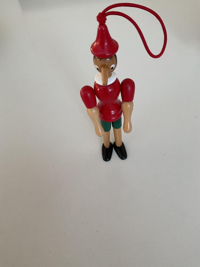 Houten Pinokkio, Ophalen