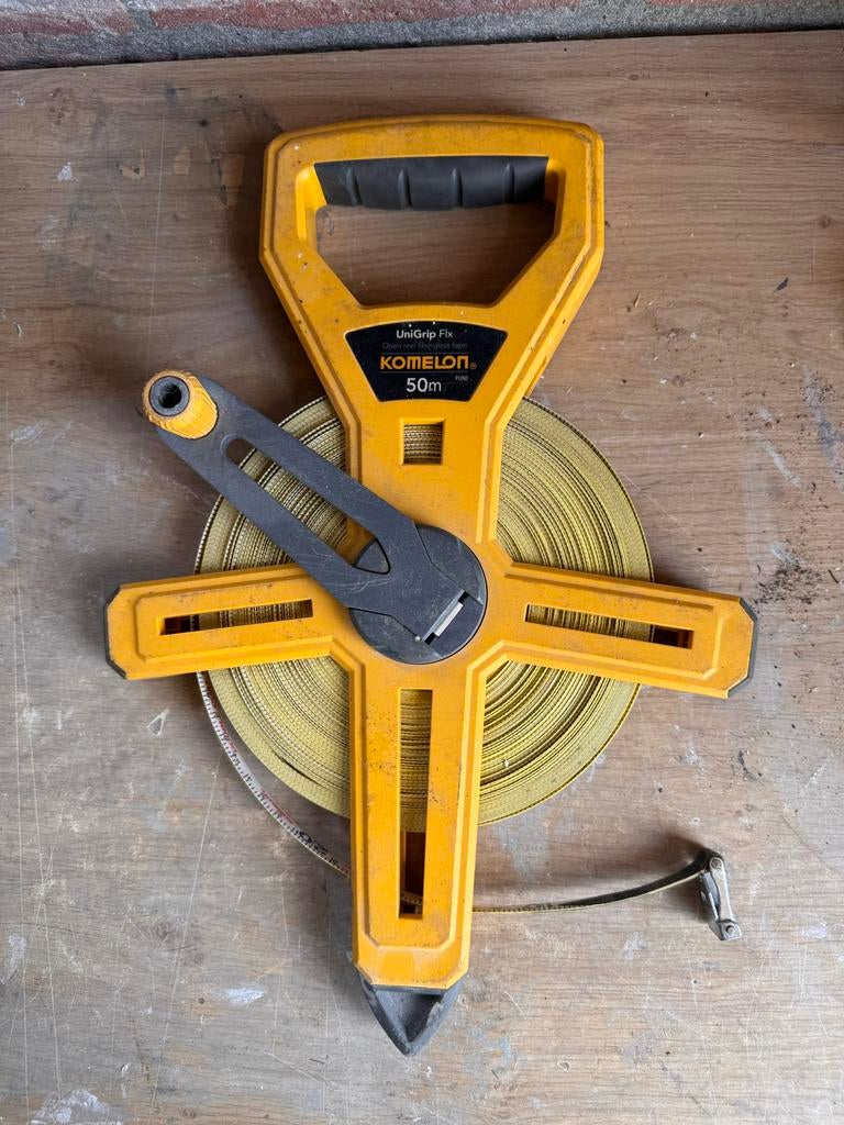 Komelon meetlint 50 meter, Ophalen of Verzenden, Gebruikt, Afstand