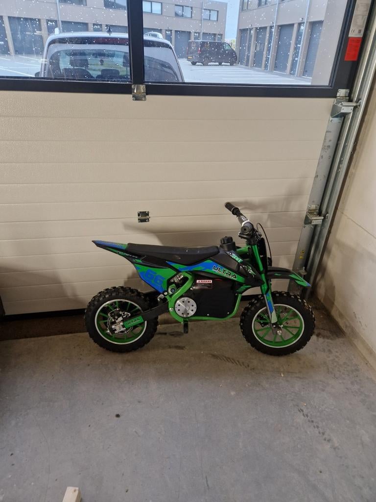 Elektrische crossmotor 1000W met helm en bodyprotector, Ophalen of Verzenden, Zo goed als nieuw, Overige typen