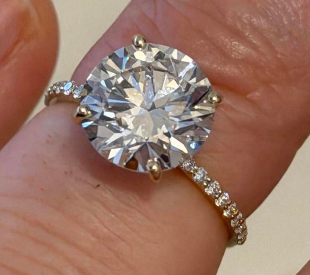 Gouden (trouw) ring met VS1 diamant van maar liefst 4.18ct!, Nieuw, Ophalen of Verzenden, 17 tot 18, Met edelsteen