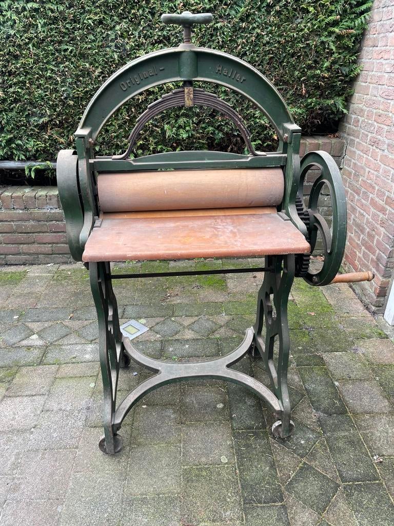 Antieke wringer, wals, Ophalen