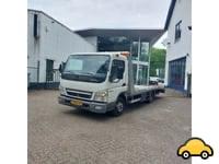 Mitsubishi Canter 3C13 | 2010 | 330.595 km | APK 02-2027, Zwart, Wit, Origineel Nederlands, Particulier