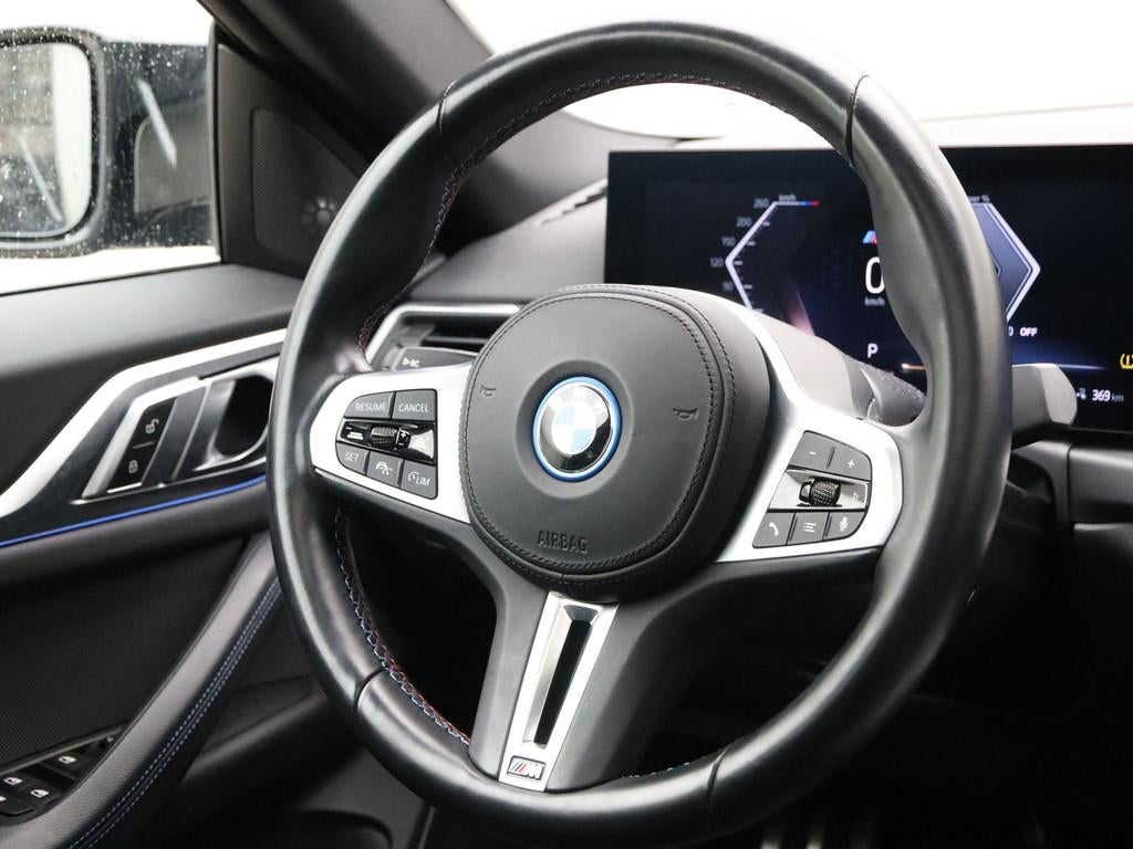 BMW i4 M50 84 kWh (bj 2023, automaat), Auto's, Gebruikt, Blauw, Alcantara, Origineel Nederlands
