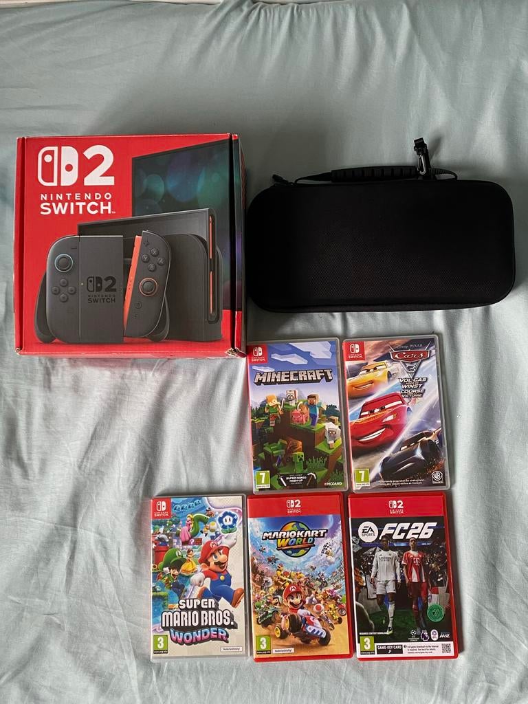 Nintendo Switch 2 met 5 spellen en accessoires, Spelcomputers en Games, Games | Nintendo Switch, Zo goed als nieuw, 2 spelers