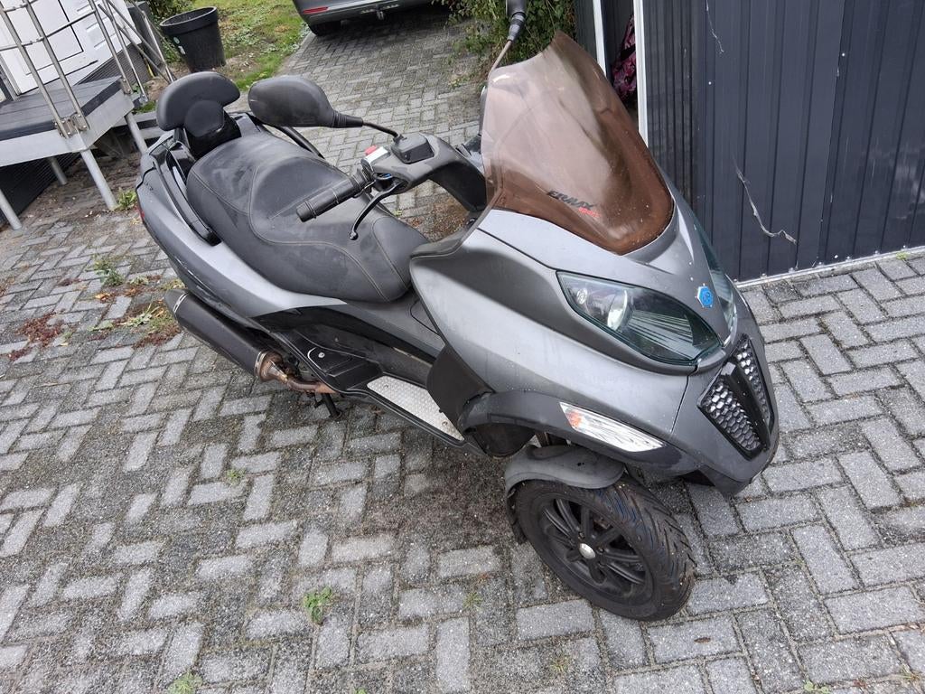 Mp3 500 piaggio & akropovic goed onderhouden top motor, Motoren, Handvatverwarming, Scooter, Bedrijf