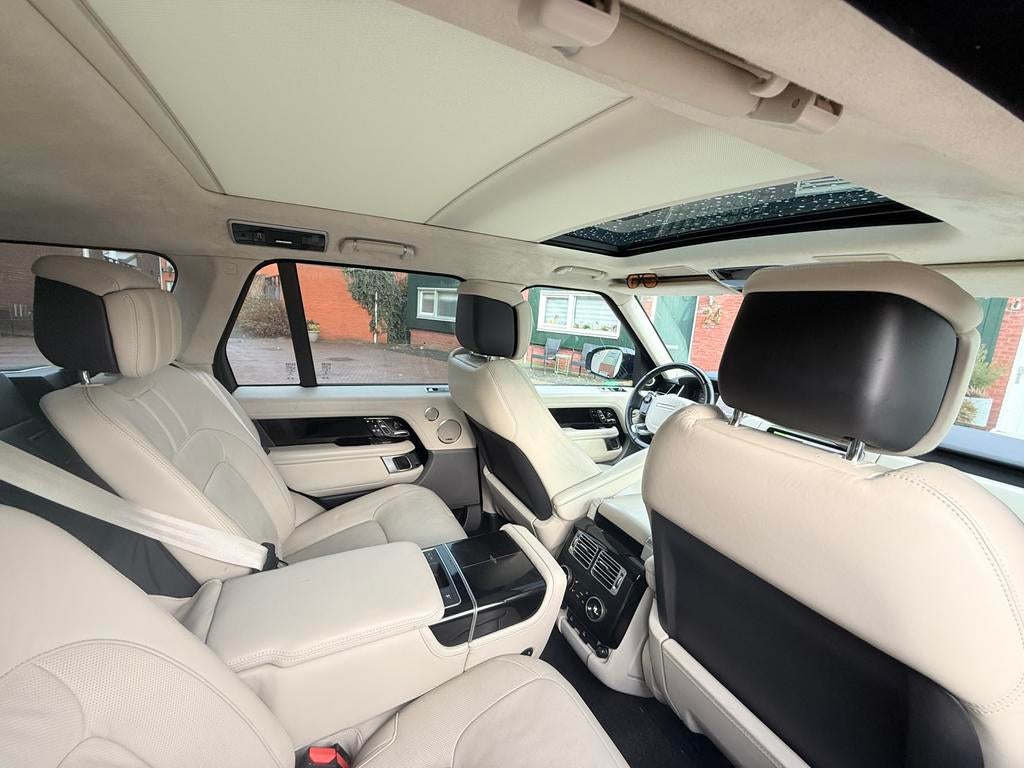Land Rover Range Rover 2.0 P400e 404pk Aut 2020 Blauw, Auto's, Land Rover, Automaat, Beige, 2500 kg, Zwart