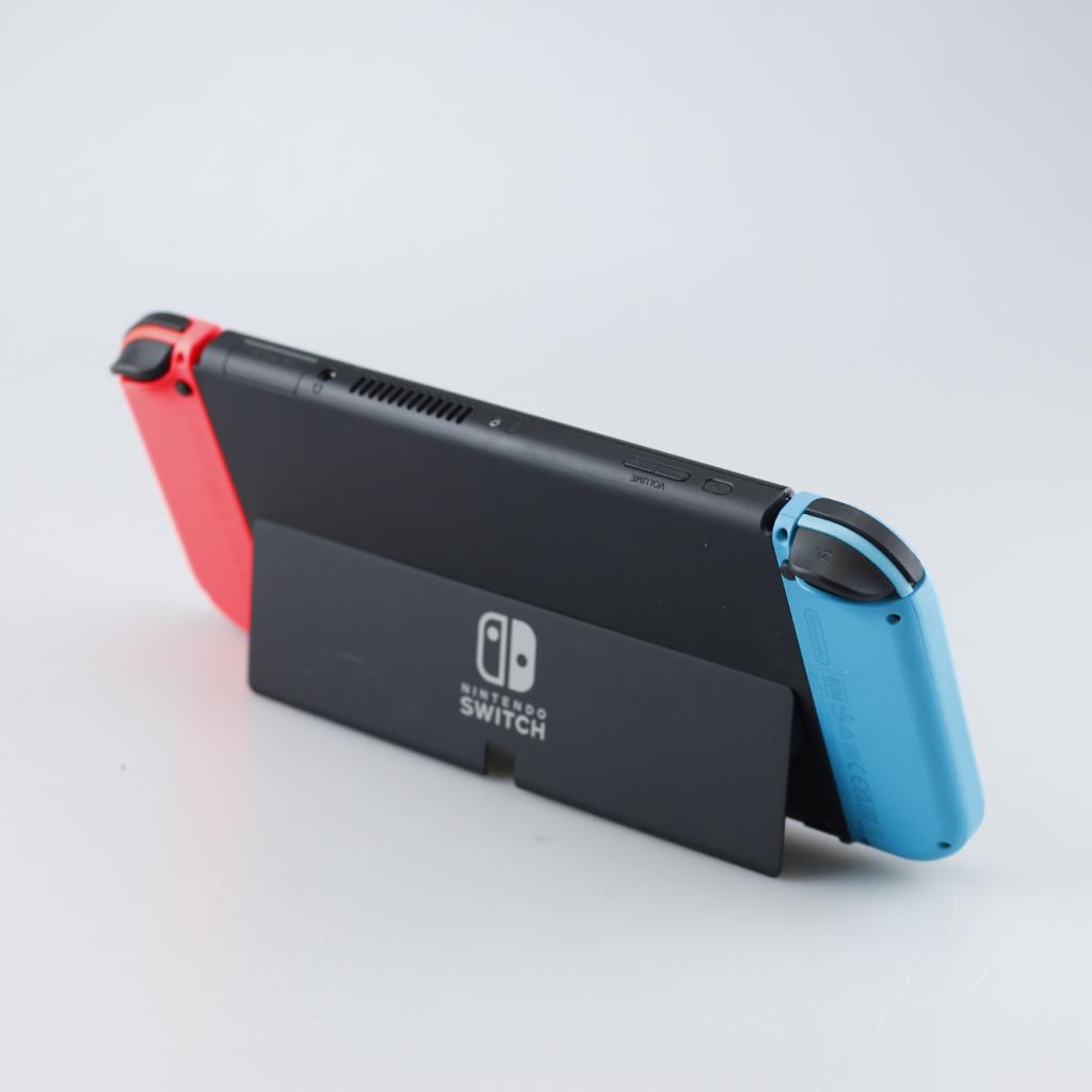 Nintendo Switch OLED 64GB Rood/Blauw, Spelcomputers en Games, Spelcomputers | Nintendo Switch, Nintendo, Zo goed als nieuw, Support@nintendo.com