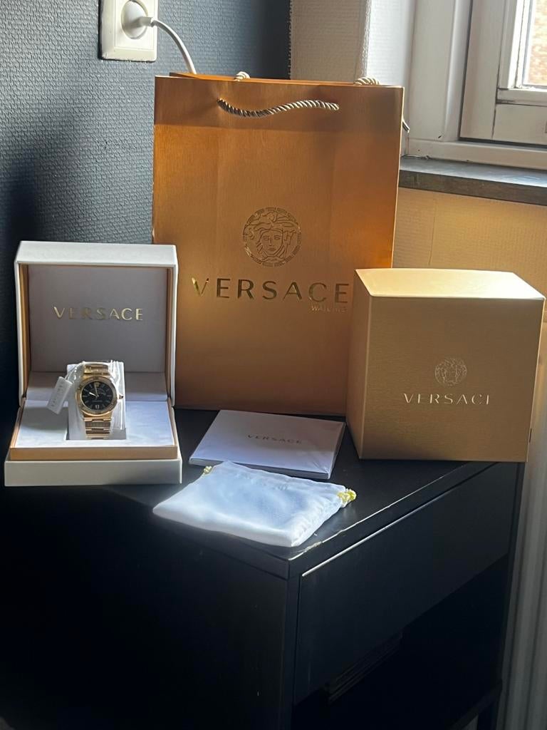 Versace moon phase horloge goud en zwart - nieuw, Sieraden, Tassen en Uiterlijk, Horloges | Heren, Overige merken, Staal, Polshorloge