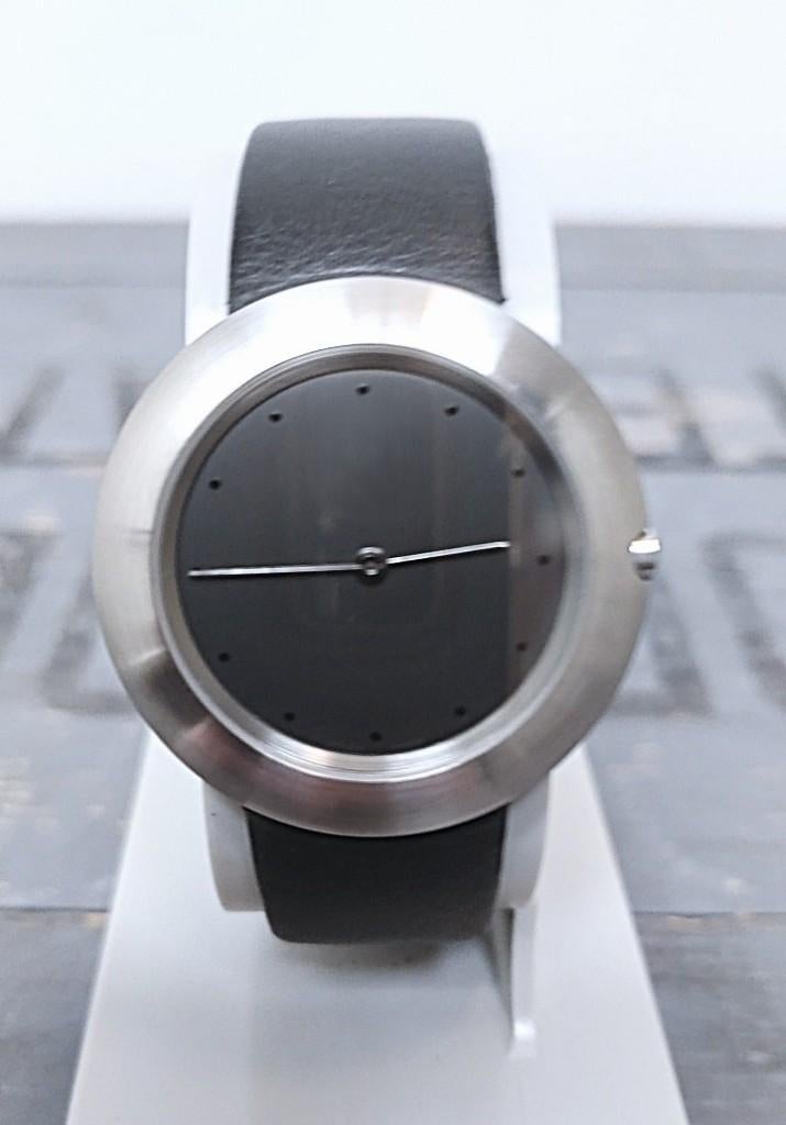 Milus 600.006 by Paul Junod, Overige merken, Leer, Staal, Polshorloge