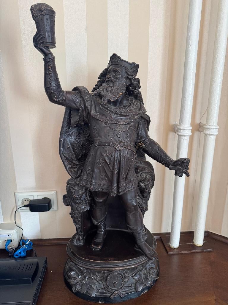 Bronskleurig gipsen beeld van Bacchus met schade, Ophalen