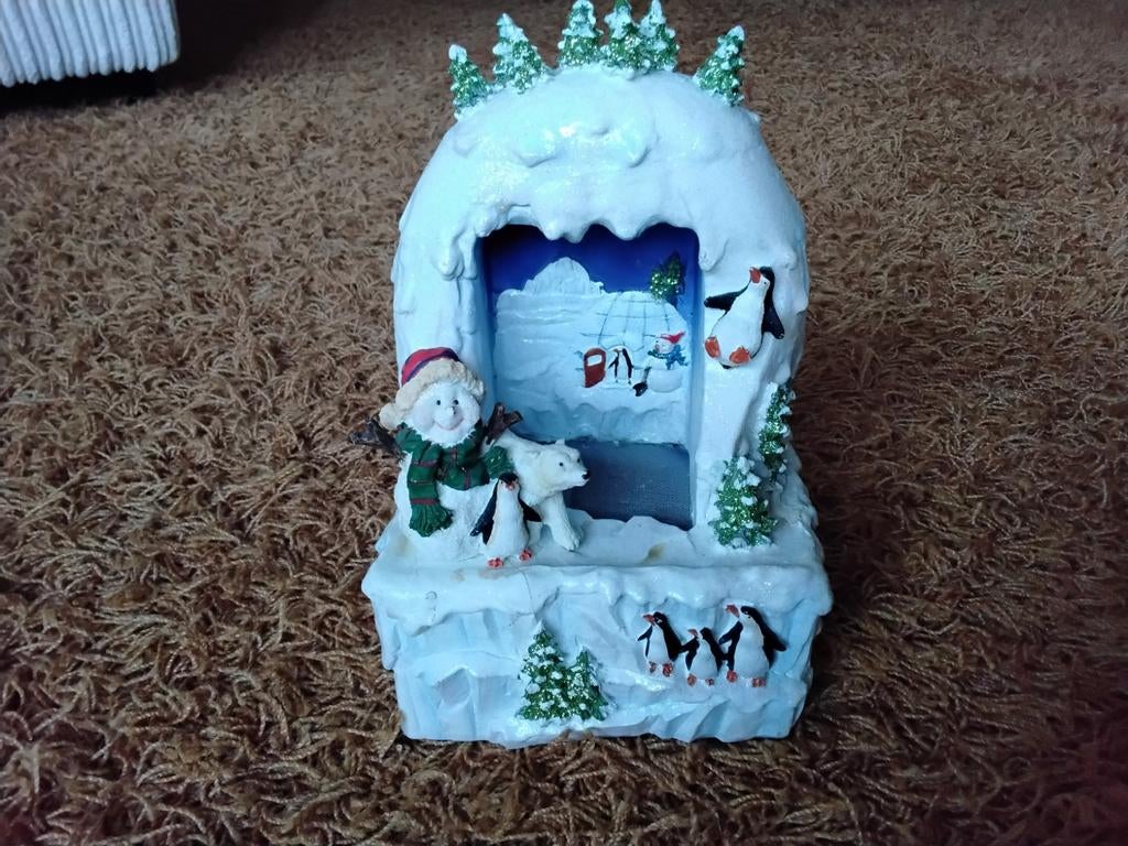 Kerst Sneeuwhut, Ophalen