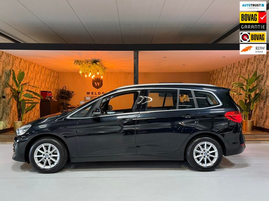 BMW 2-serie Gran Tourer 218i Executive Edition Garantie Crui, Auto's, BMW, Stof, Gebruikt, 2-Serie Gran Tourer, Zwart