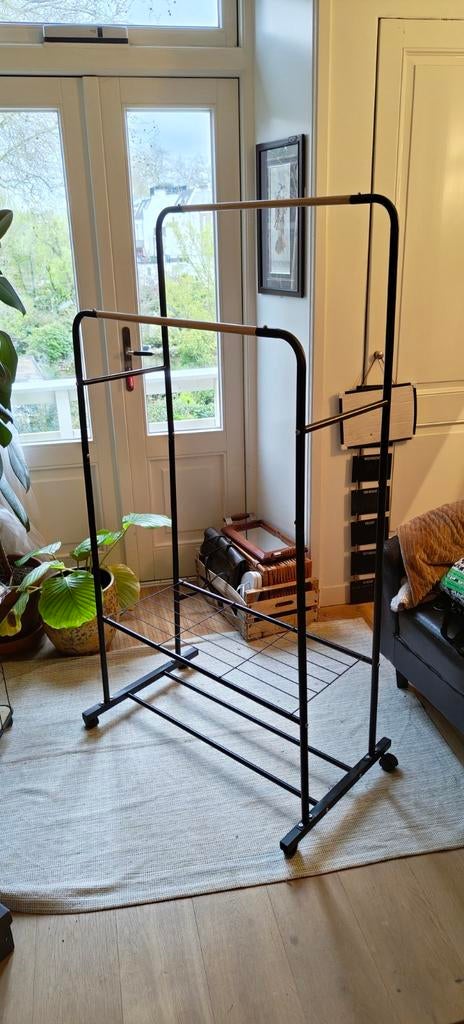 Kledingrek met twee stangen en opbergruimte, Ophalen