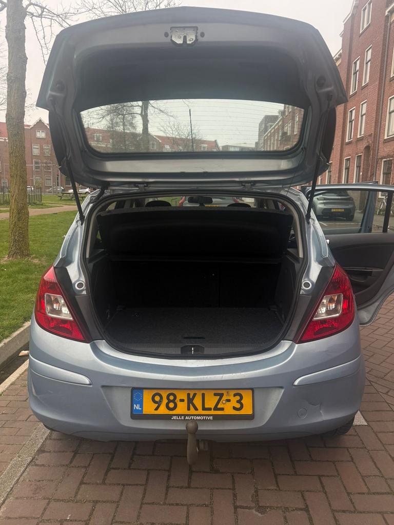 Opel Corsa 1.4 16V 5D 2010 Blauw, Auto's, Opel, Voorwielaandrijving, 1063 kg, Zwart, 4 cilinders