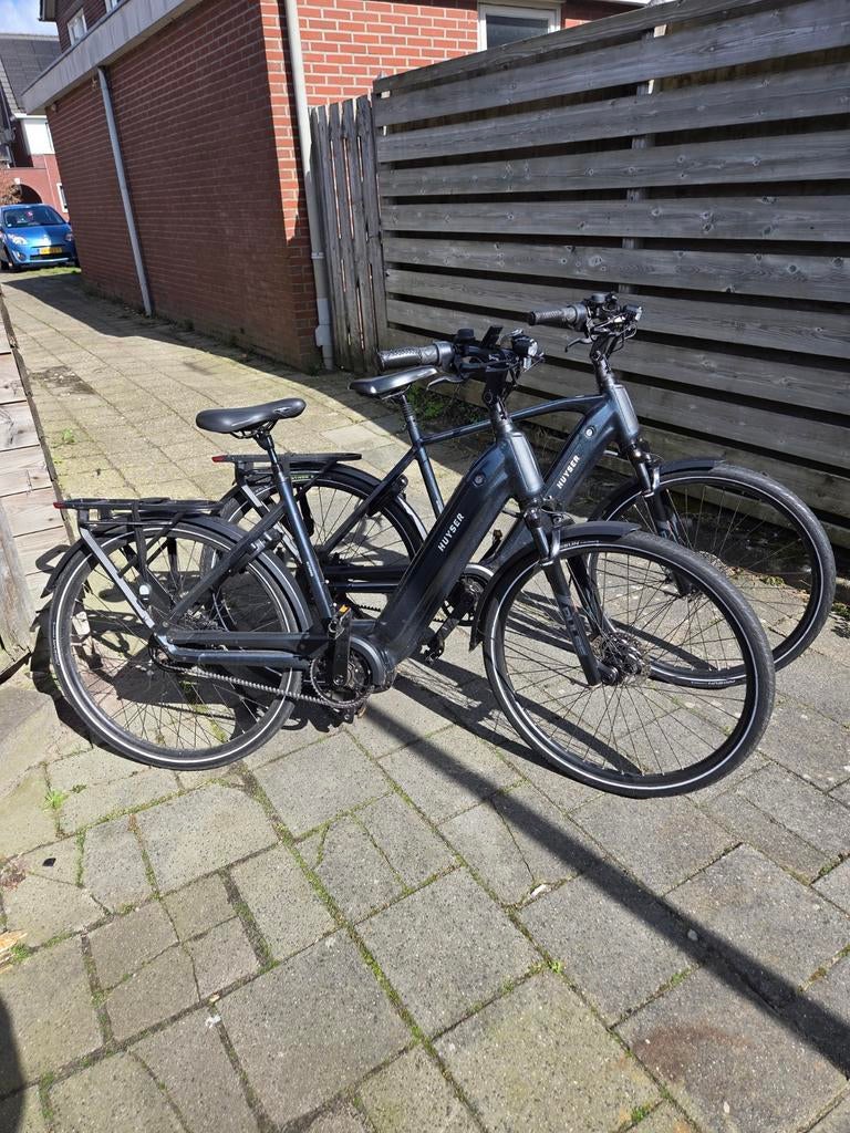 Setje huyser ultremo elektrische dames en herenfiets, Zo goed als nieuw, 51 tot 55 cm, 50 km per accu of meer, Ophalen