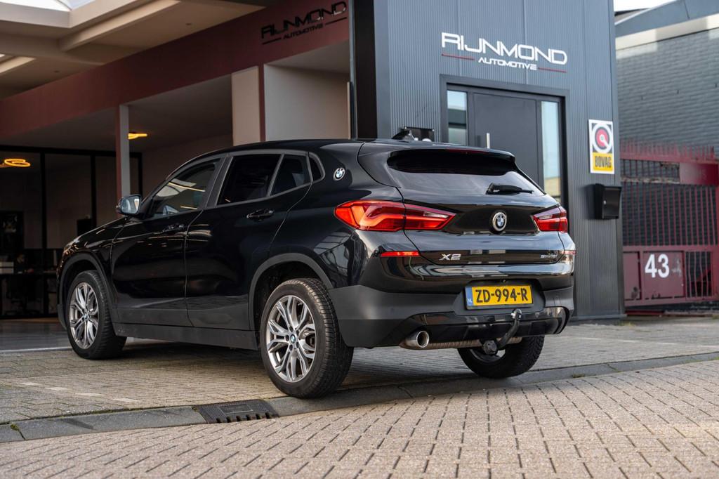 BMW X2 sDrive18i Automaat |Navigatie full map |Cruise contro, Gebruikt, Zwart, 3 cilinders, 1390 kg